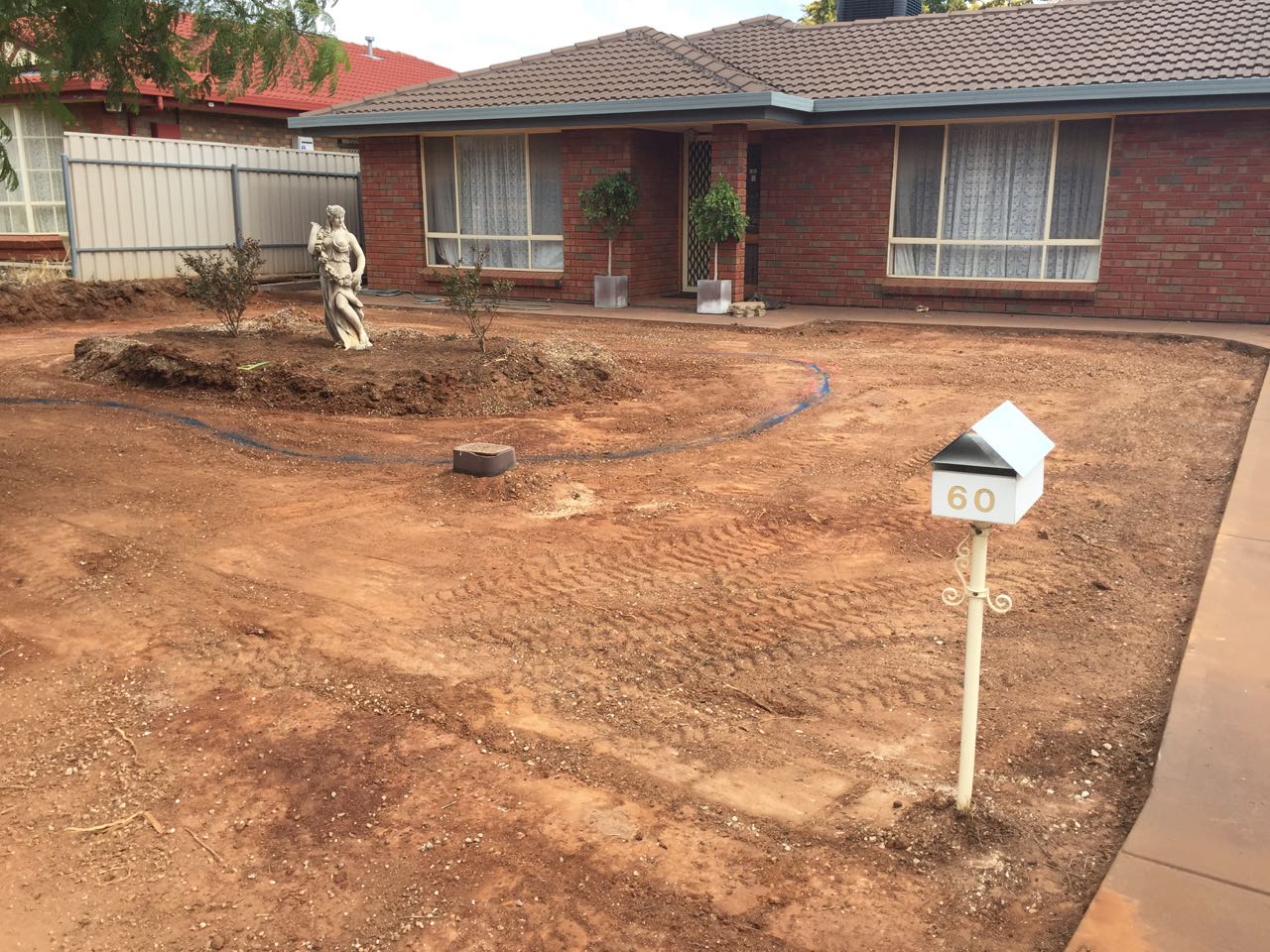 Craigmore - Installing Light & Water Feature With Retaining Wall